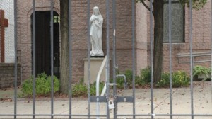 cropped-Closed-gates-and-Mary-small1-e1395077846729.jpg